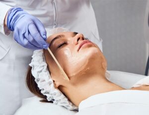 close up of woman receiving facial treatment at medical spa in charlotte, nc